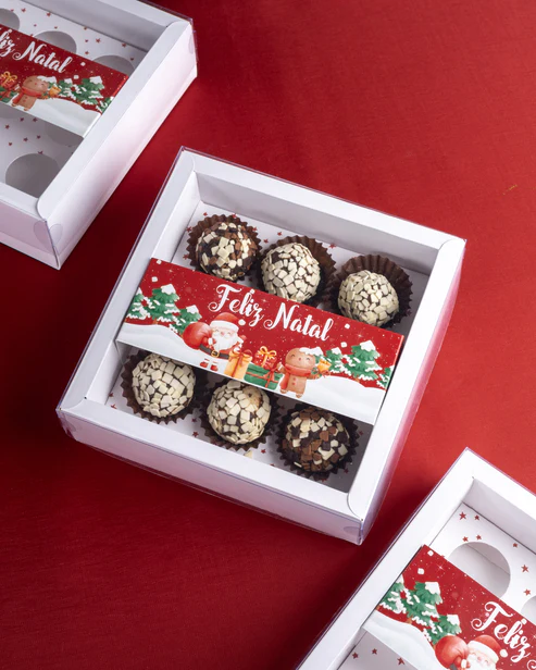 3001005943.webp Caixa Cartolina C/ Tampa PVC p/ 9 Brigadeiros Natal "Magia" – Norpack - Image 1