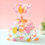 Saco Plástico c/ Fita Páscoa Transparente Rosa e Amarelo 30x40cm - Pack 30unid – Norpack - Image 5